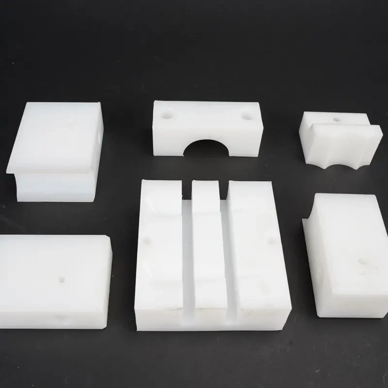 Custom hdpe plastic block wear parts uhmwpe block plastic flanged bushings Slide track delrin cnc plastic parts